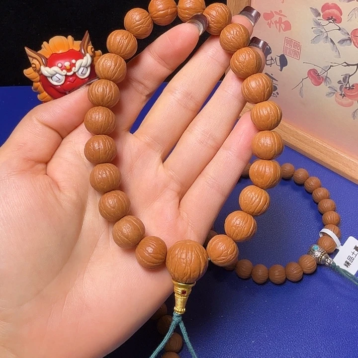 L***B吊坠猴头核桃聚宝盆
