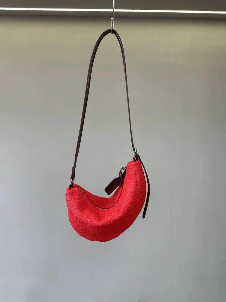 头层牛皮拼接牛角包真皮腋下包饺子包小众设计手提包单肩斜挎包女