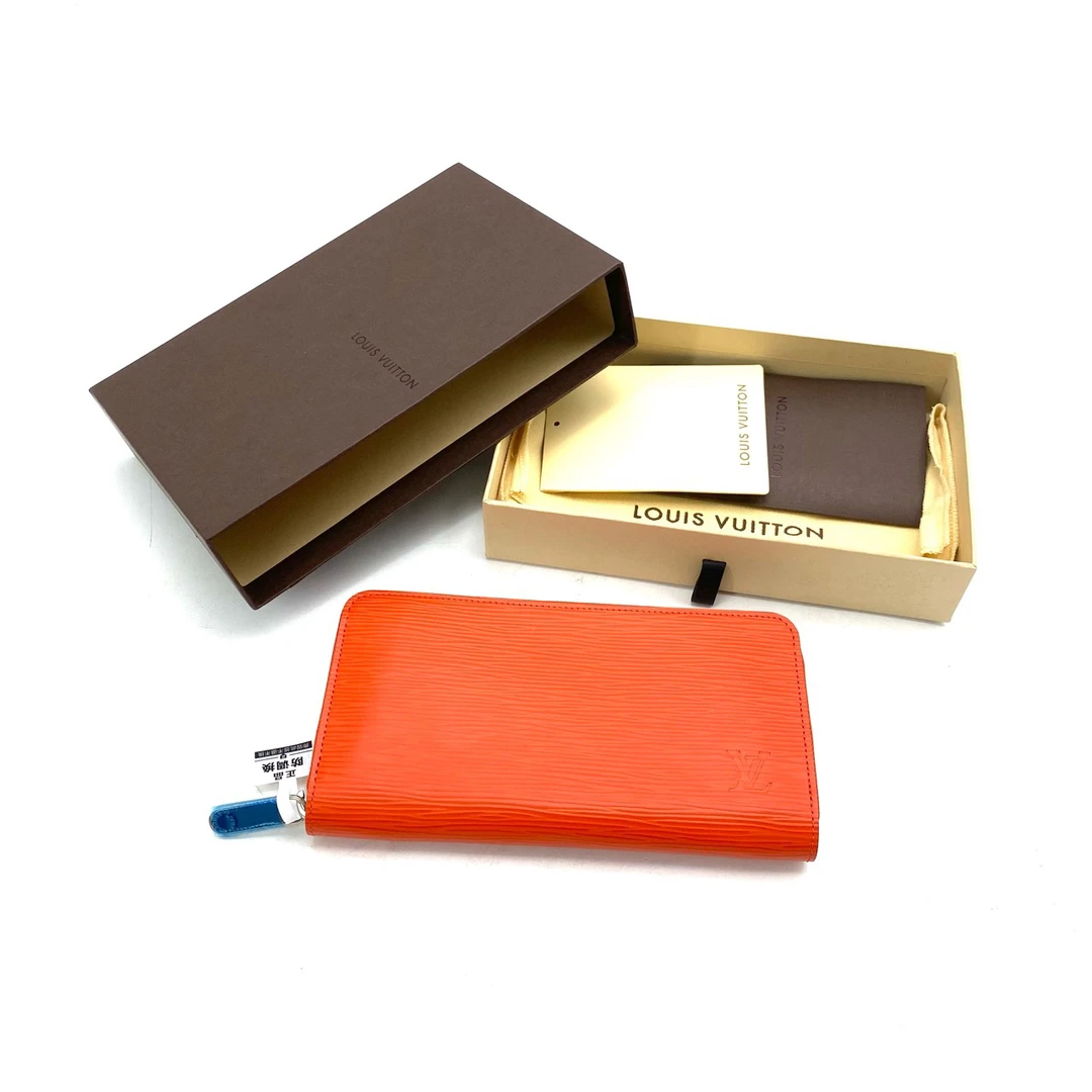 全新未使用 LouisVuitton/路易威登 橘色全皮水波纹拉链钱包20/10