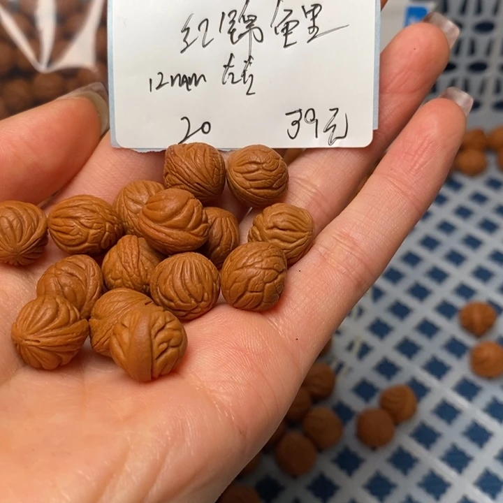 桃核手串12尺寸左右野生红锦鲤打好底带绳打孔20颗