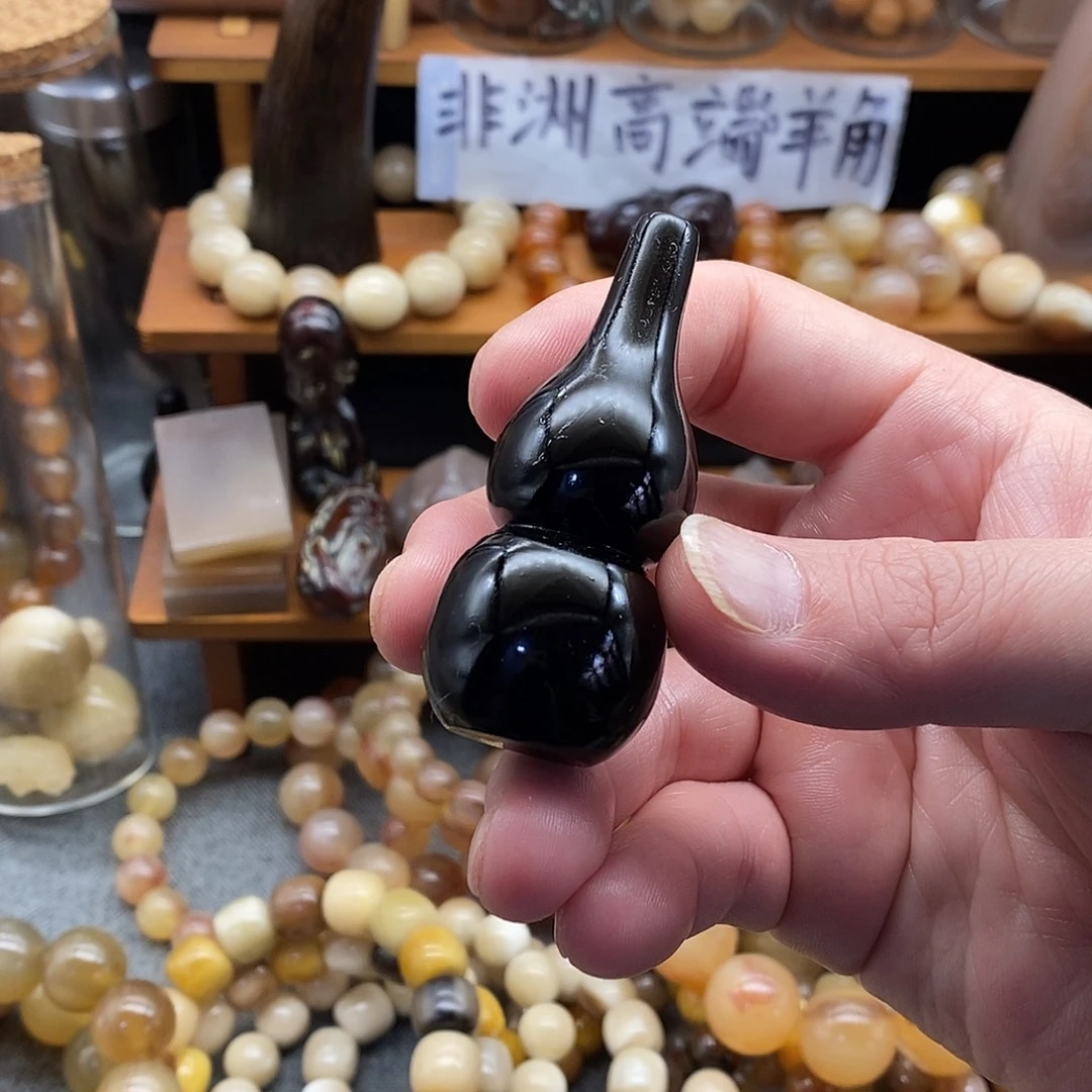 布艺非金属6.3cm非洲黑水牛角手把件