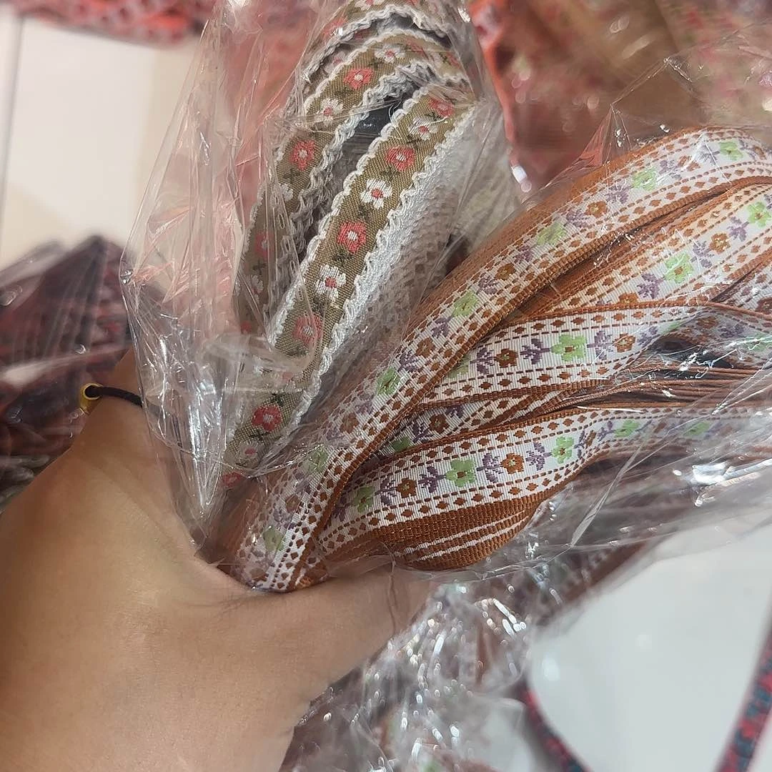 郑*服装辅料花边织带