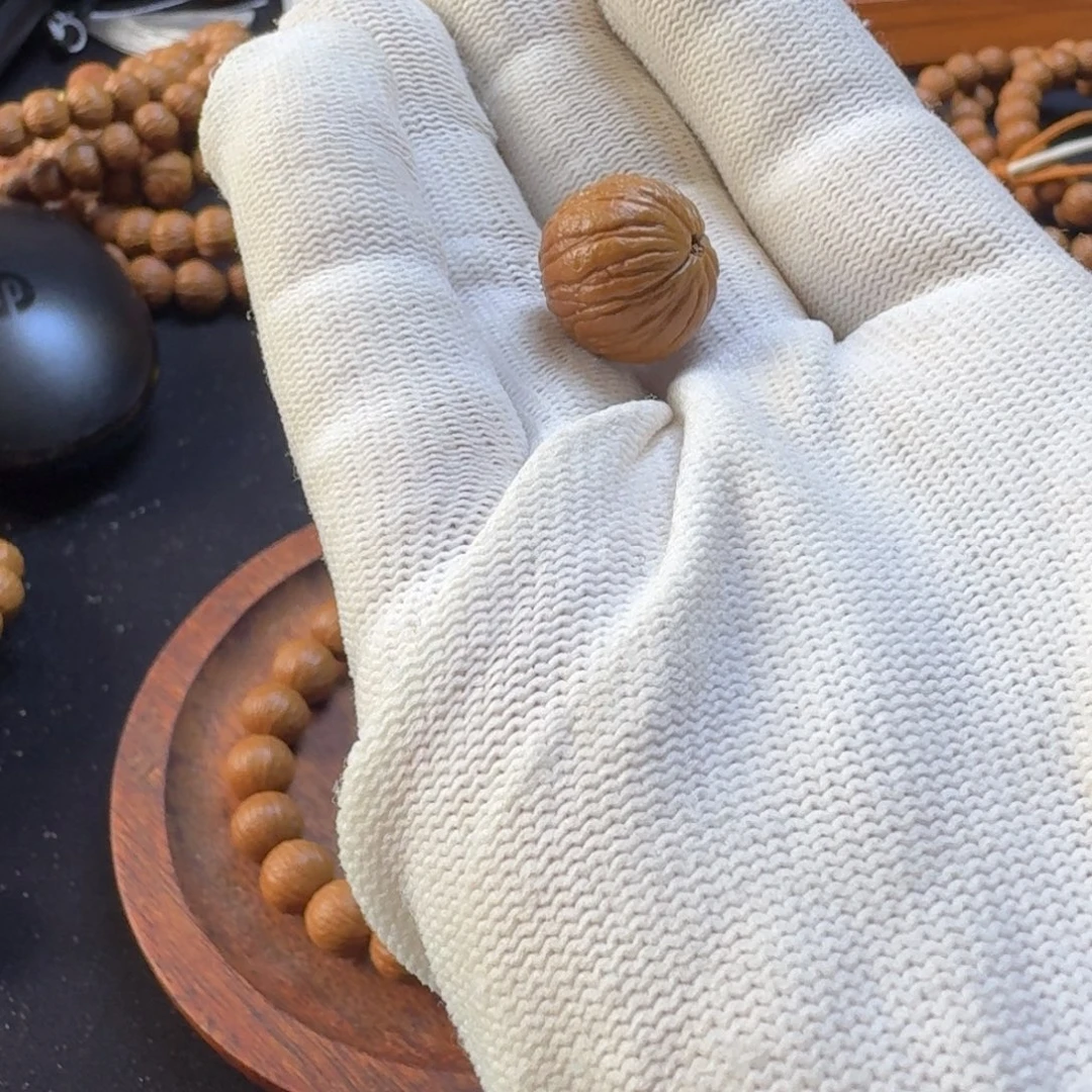 个***木手串猴头核桃三通