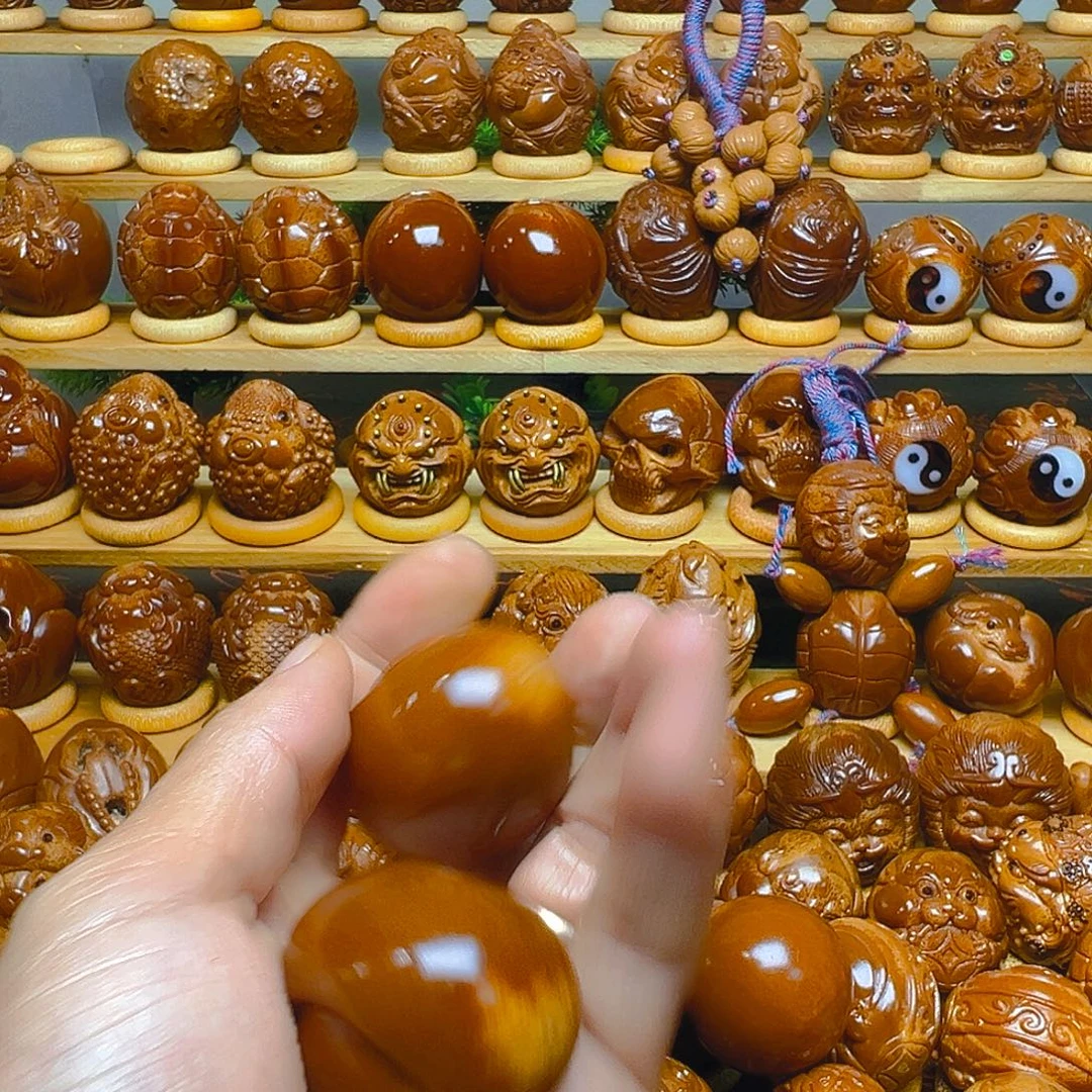 皮***丘手串/手链橄榄核大元宝一对