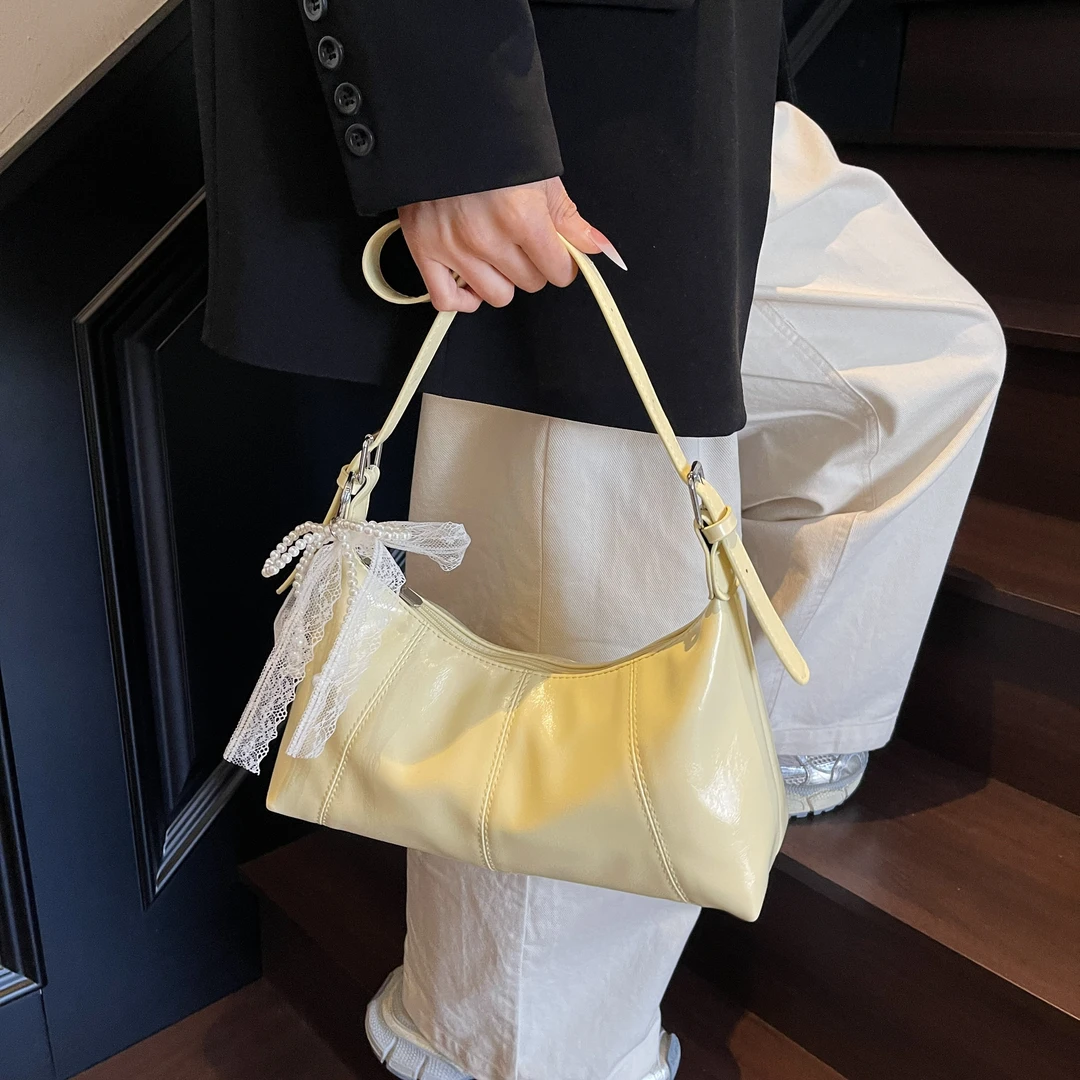 大容量包包女夏天2025新款小众设计复古单肩斜挎包上课通勤饺子包