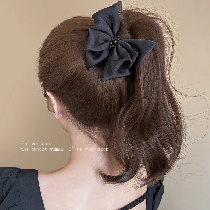 黑色蝴蝶结丸子头抓夹女高级感2025新款鲨鱼夹饱满后脑勺发夹发饰