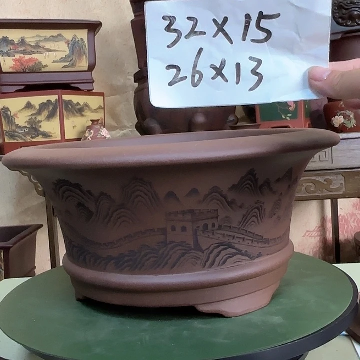紫砂花盆刻绘万里长城