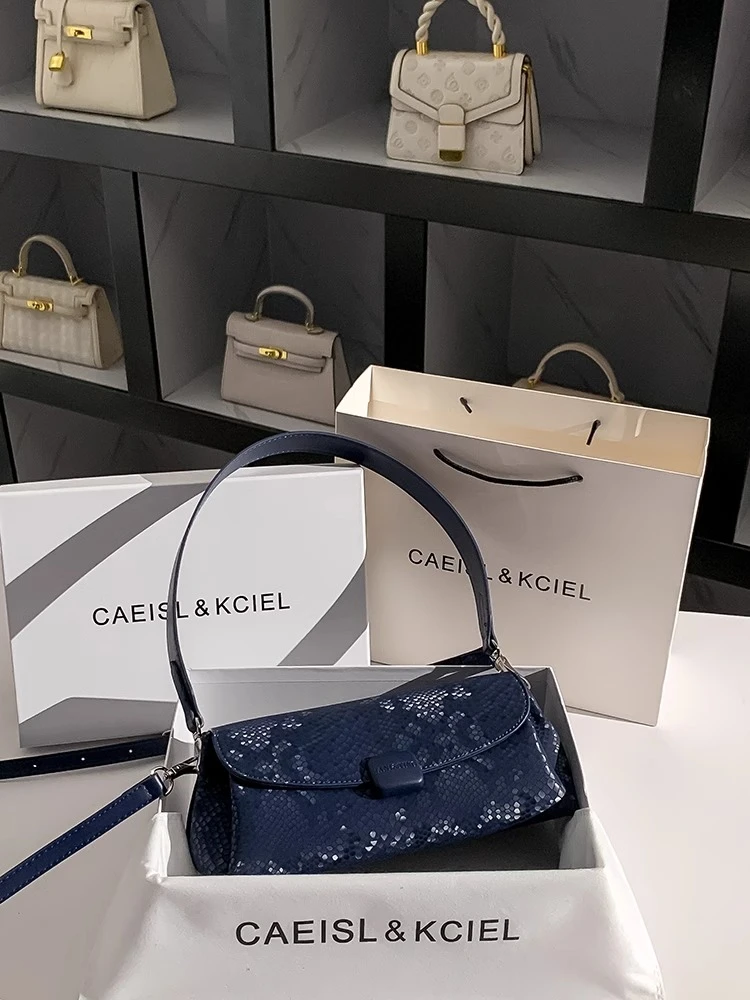 CAEISL&KCIEL女包高级感蛇纹手提单肩包女2025新款潮大容量新月包