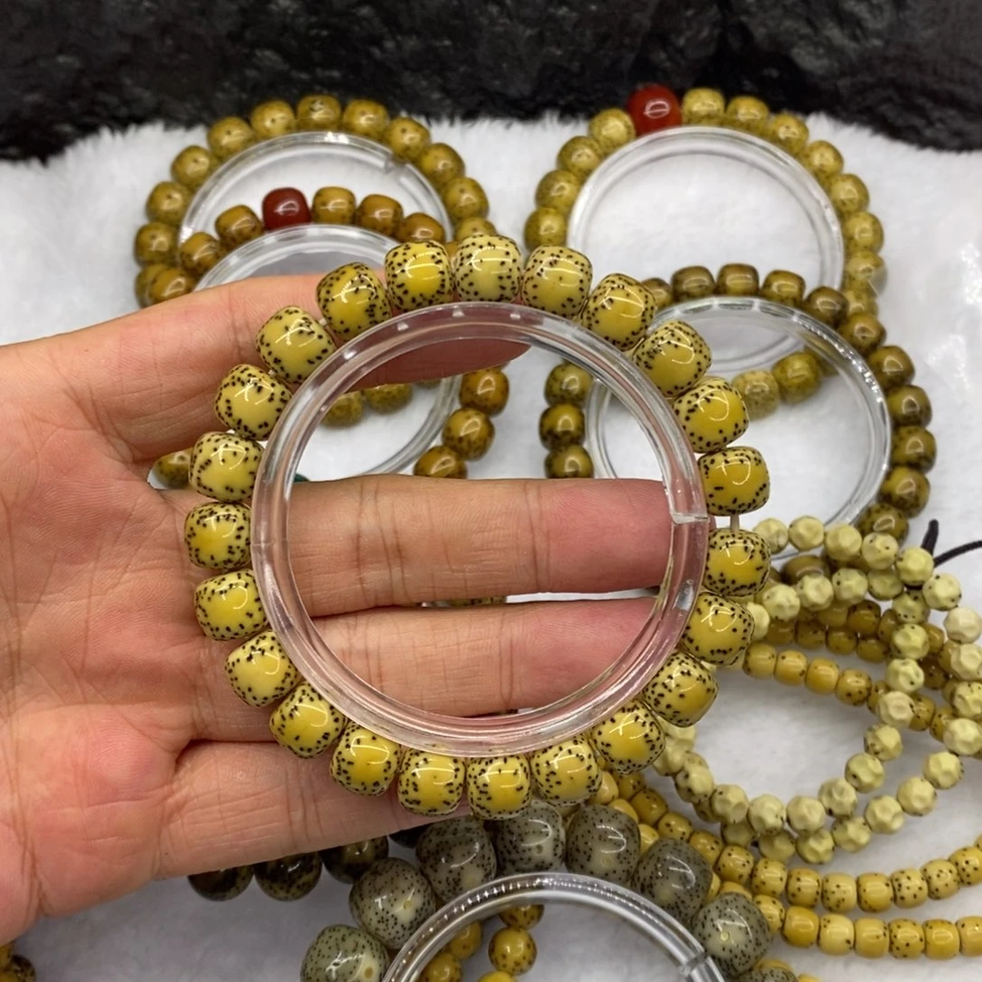星月菩提手串10*9侧留白鸡油黄