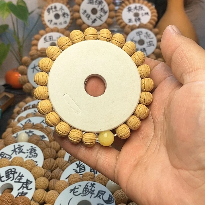 【闪购商品】哈****。桃核手串手链野生小籽