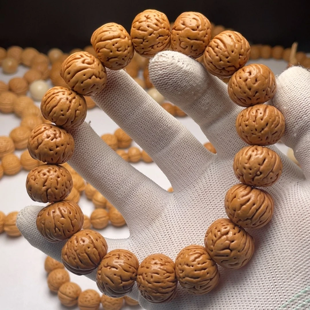 欢***好桃核手串肉纹元宝