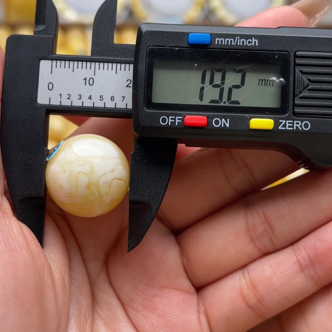 琥珀未镶嵌裸石蜜蜡圆珠笑