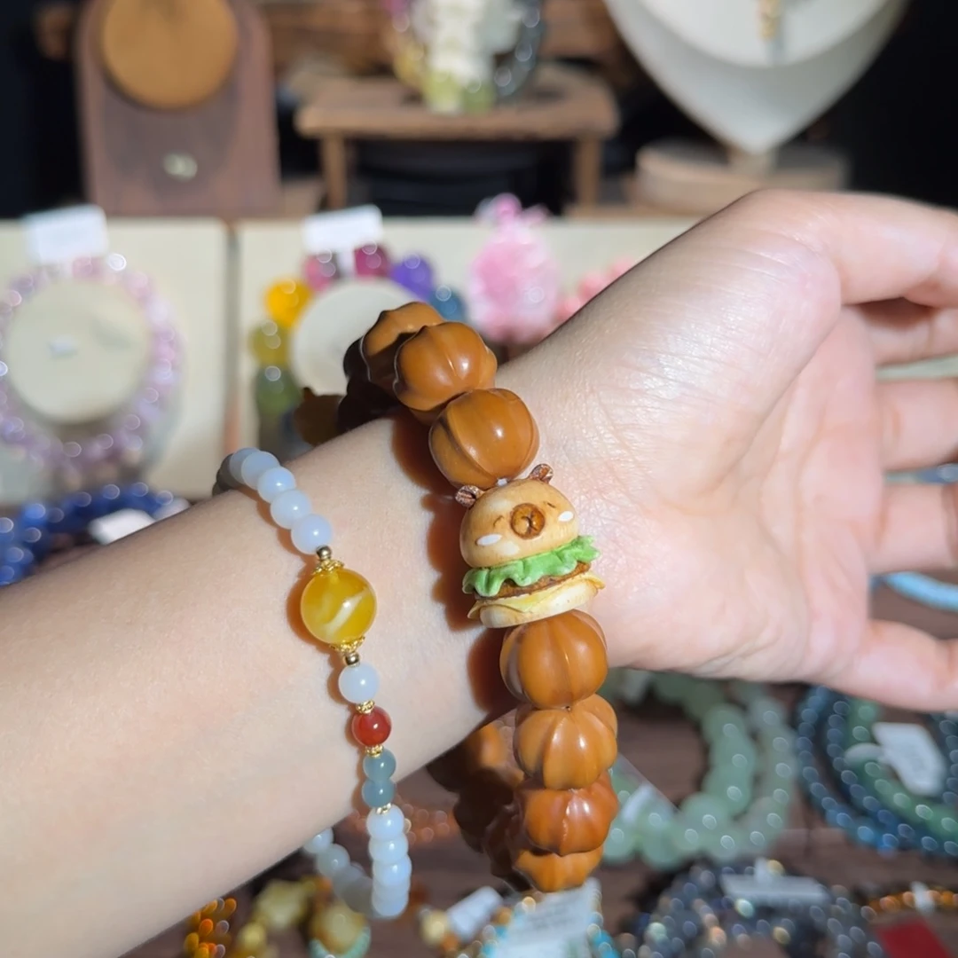 橘***i银S925镶嵌手链水晶猴头+白玉  676