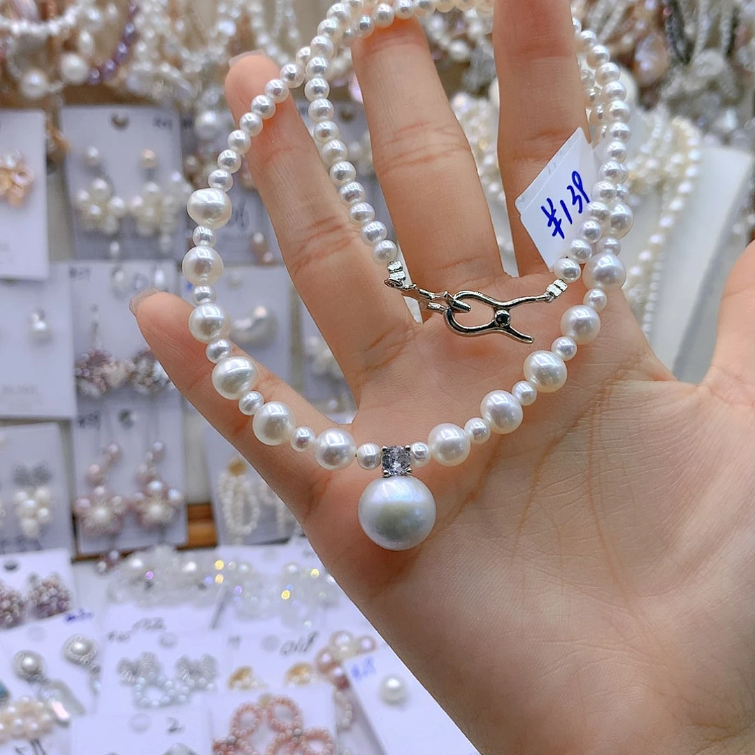 银S925镶嵌淡水珍珠耳饰小*鹂