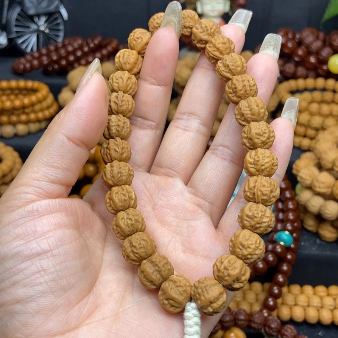 猴头核桃手串沁*小霸王龙京八棱手持