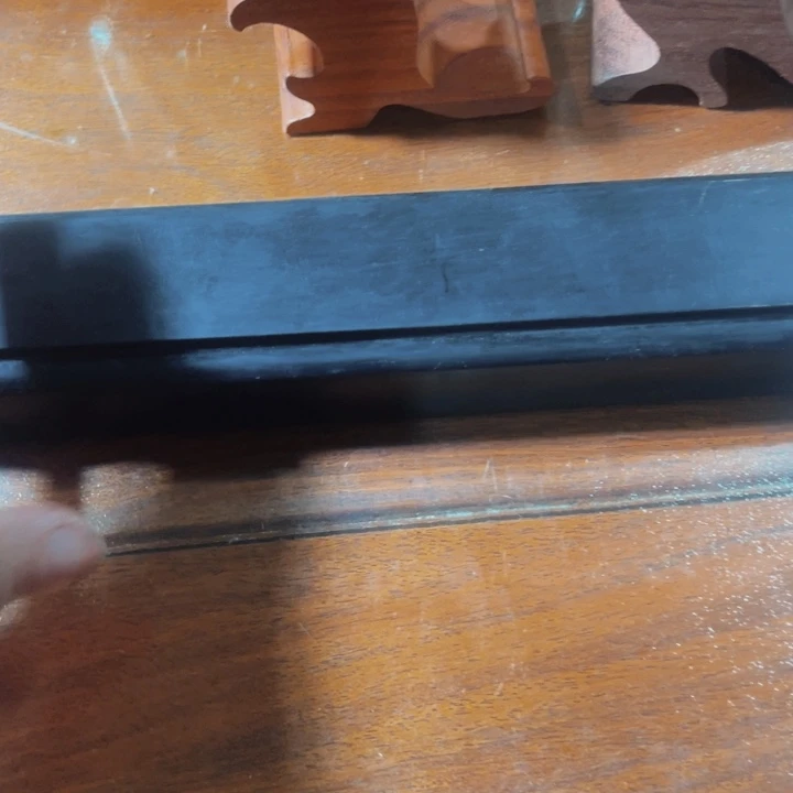吉***瑞乌木紫光檀的镇尺一对