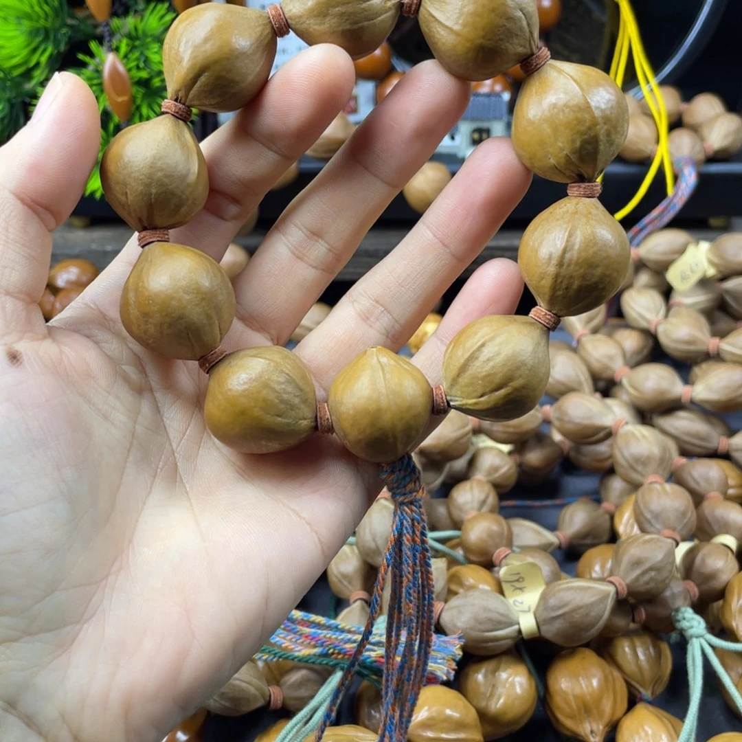 暮***雪橄榄核吊坠001正圆老料