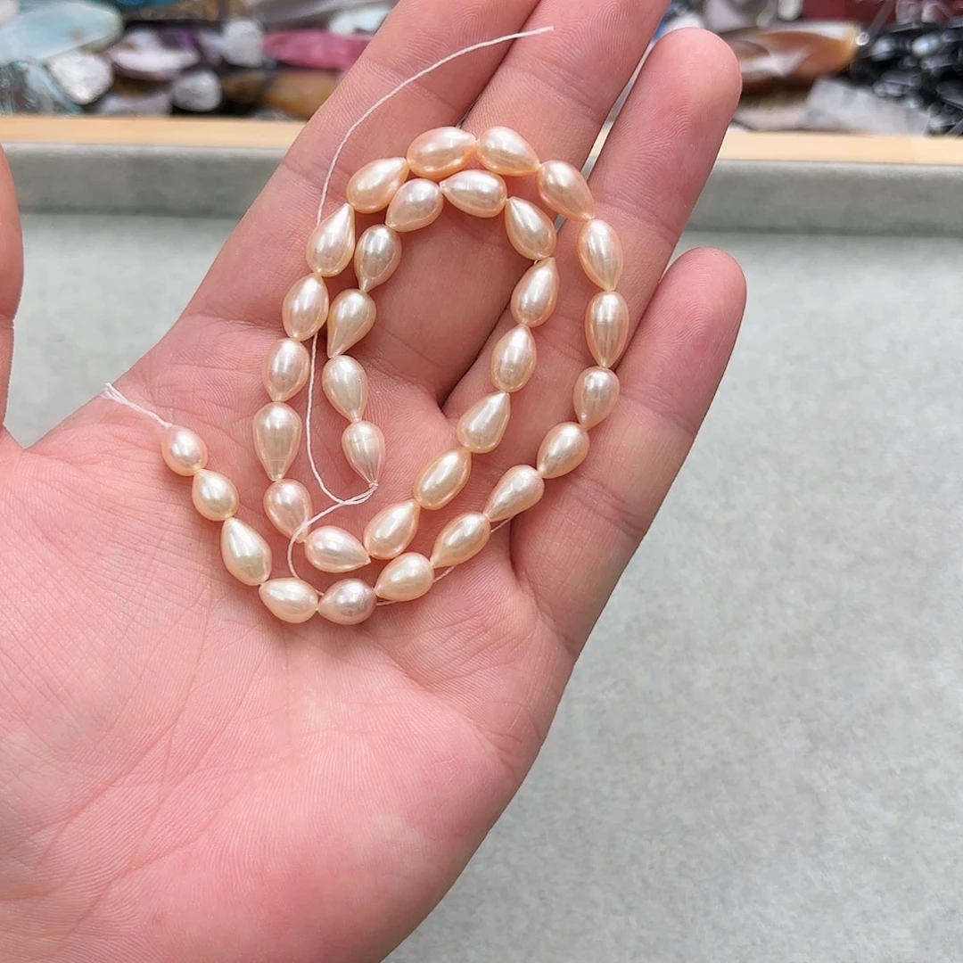 玛瑙/玉髓未镶嵌珠宝半成品6-7香槟水滴珍一条59