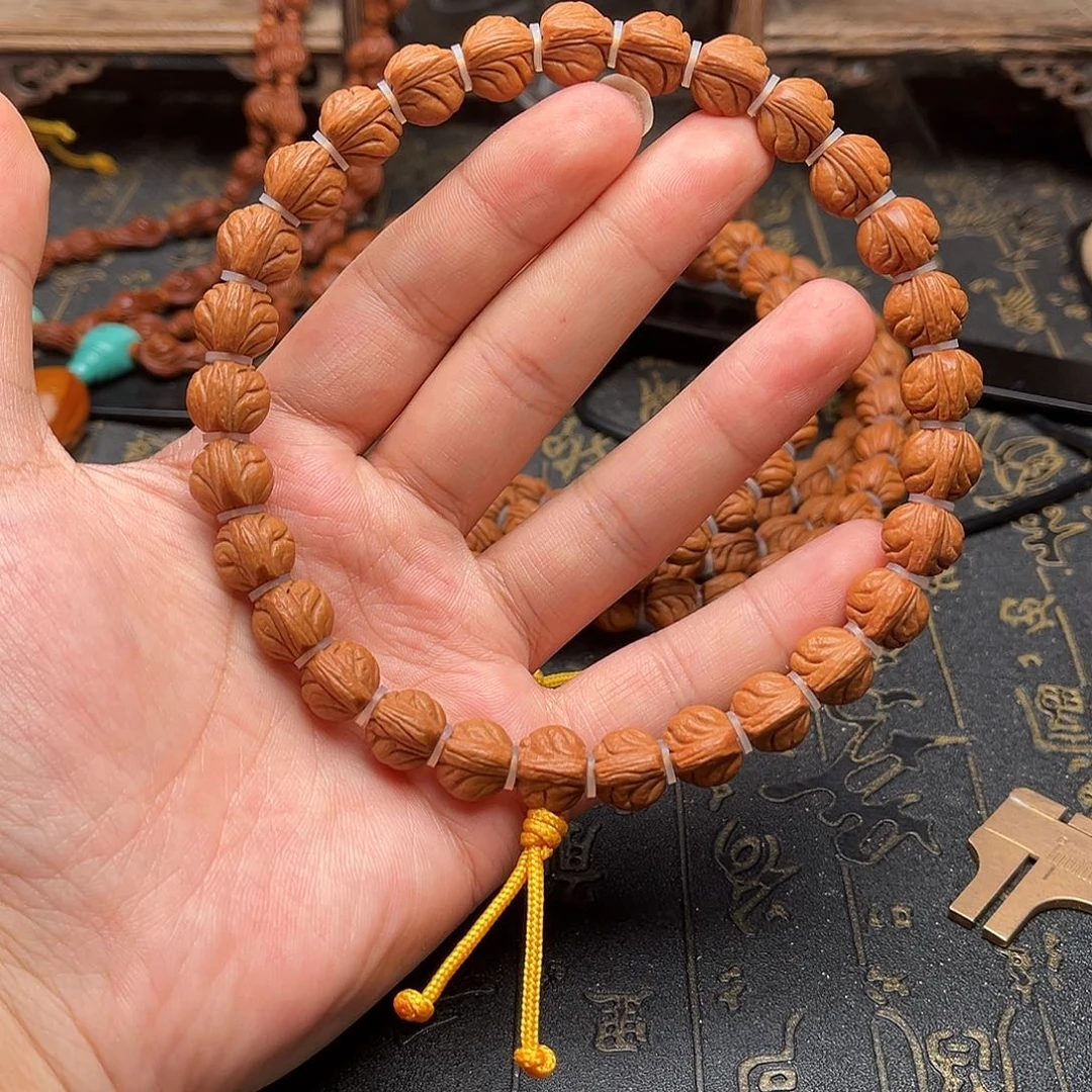 桃核吊坠玉龙手持