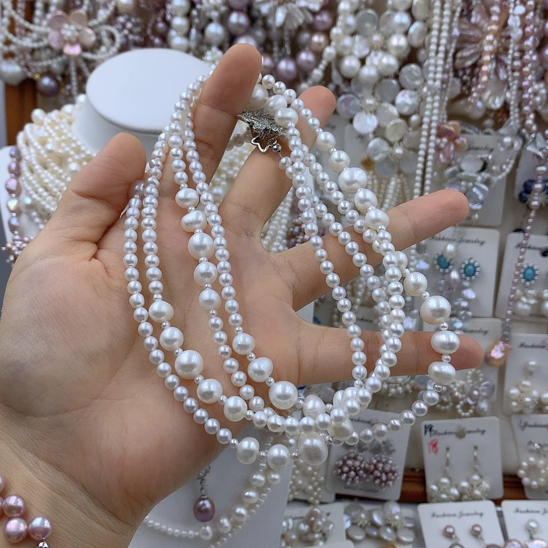 阿***。淡水珍珠银S925镶嵌项链耳饰