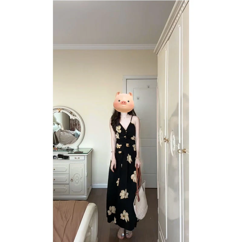 时尚高级感吊带印花连衣裙女2025夏季新款法式小众气质小黑裙子女