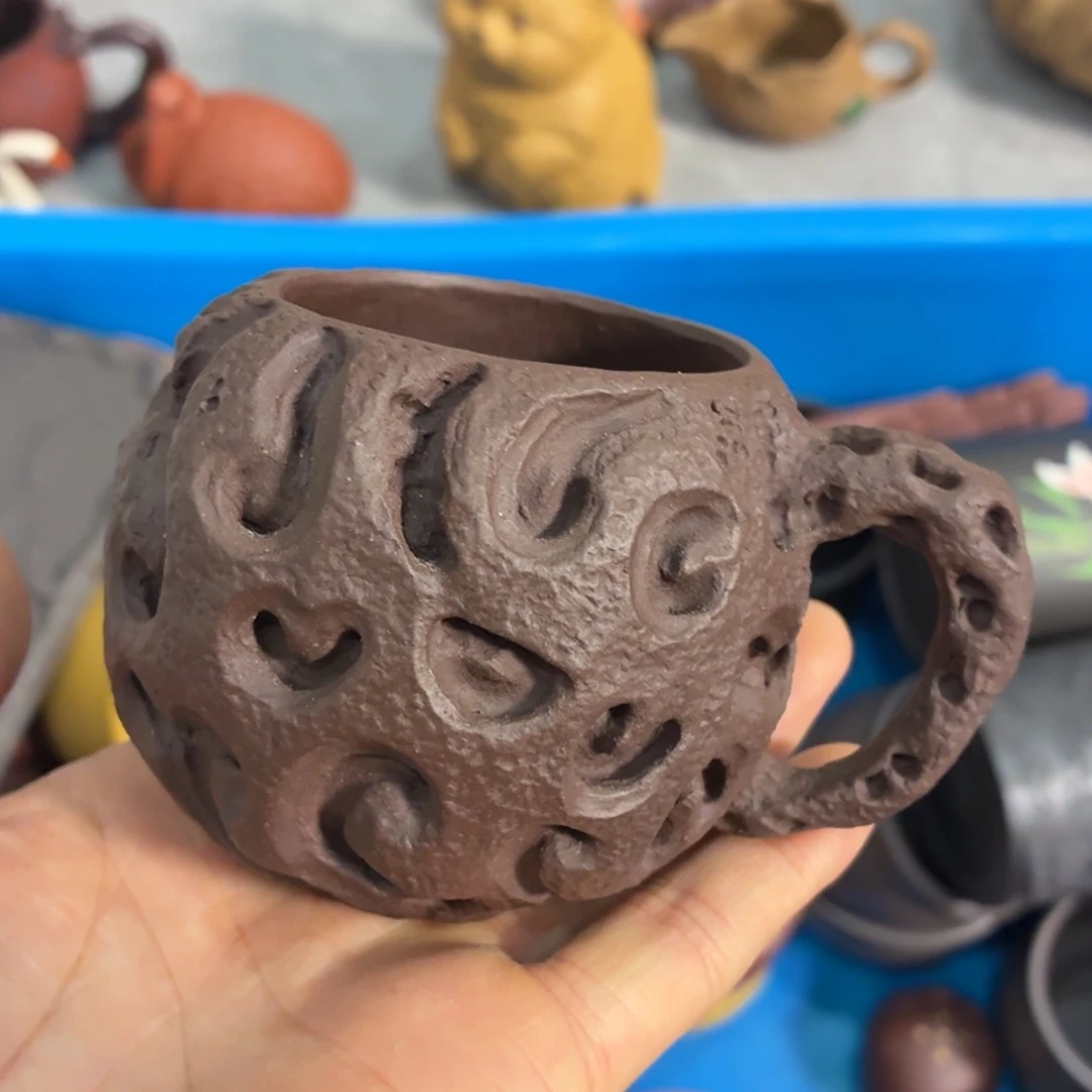 茶杯紫砂放漏放漏放大漏了