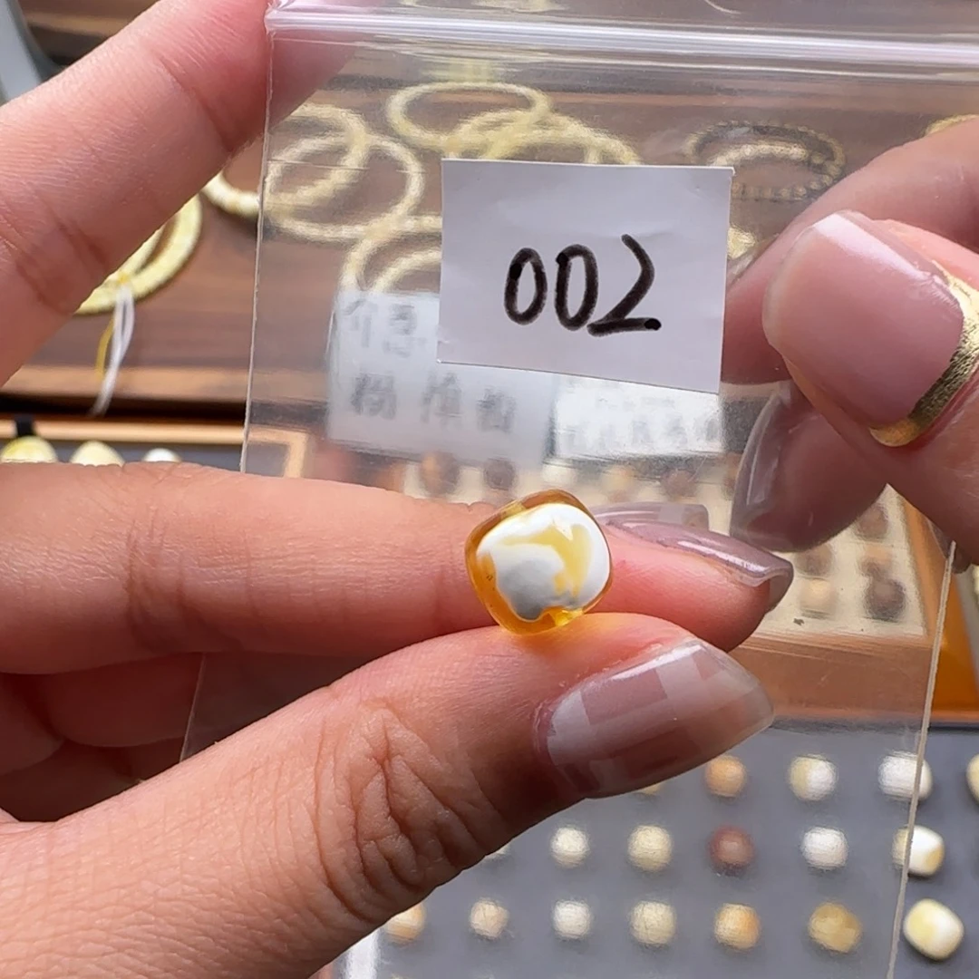 琥珀未镶嵌珠宝奇石9.6mm微花粉