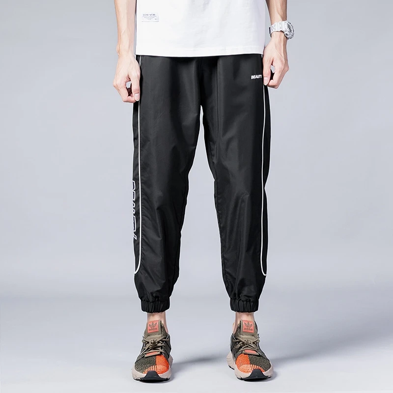 0550休闲九分裤男束脚哈伦裤夏季宽松运动裤男韩版潮牌裤子