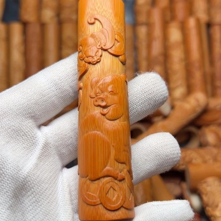 蒲***英实心竹雕刻手把件