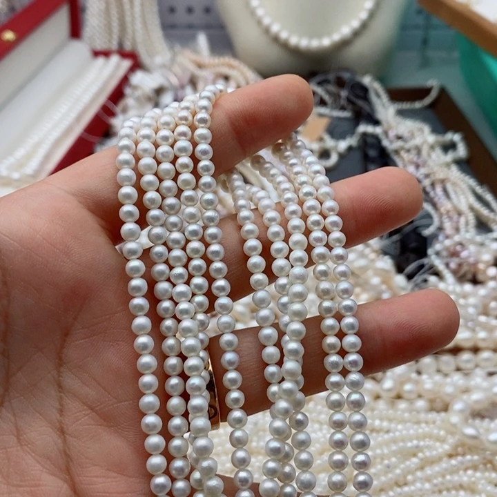 玛瑙/玉髓未镶嵌珠宝半成品一条近正圆冷白光珍珠半成品
