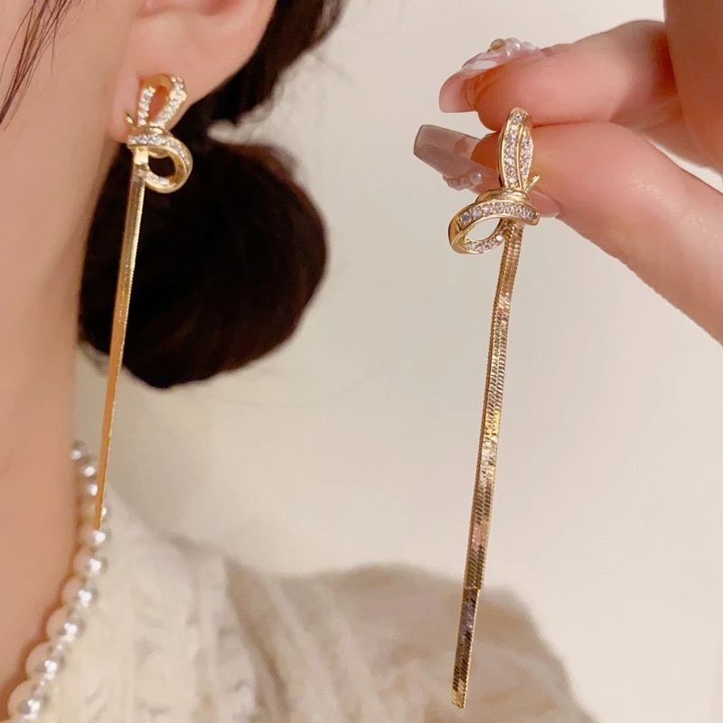 铜合金合成锆石耳饰 小众时尚轻奢微镶锆石蝴蝶结长流苏耳钉1200