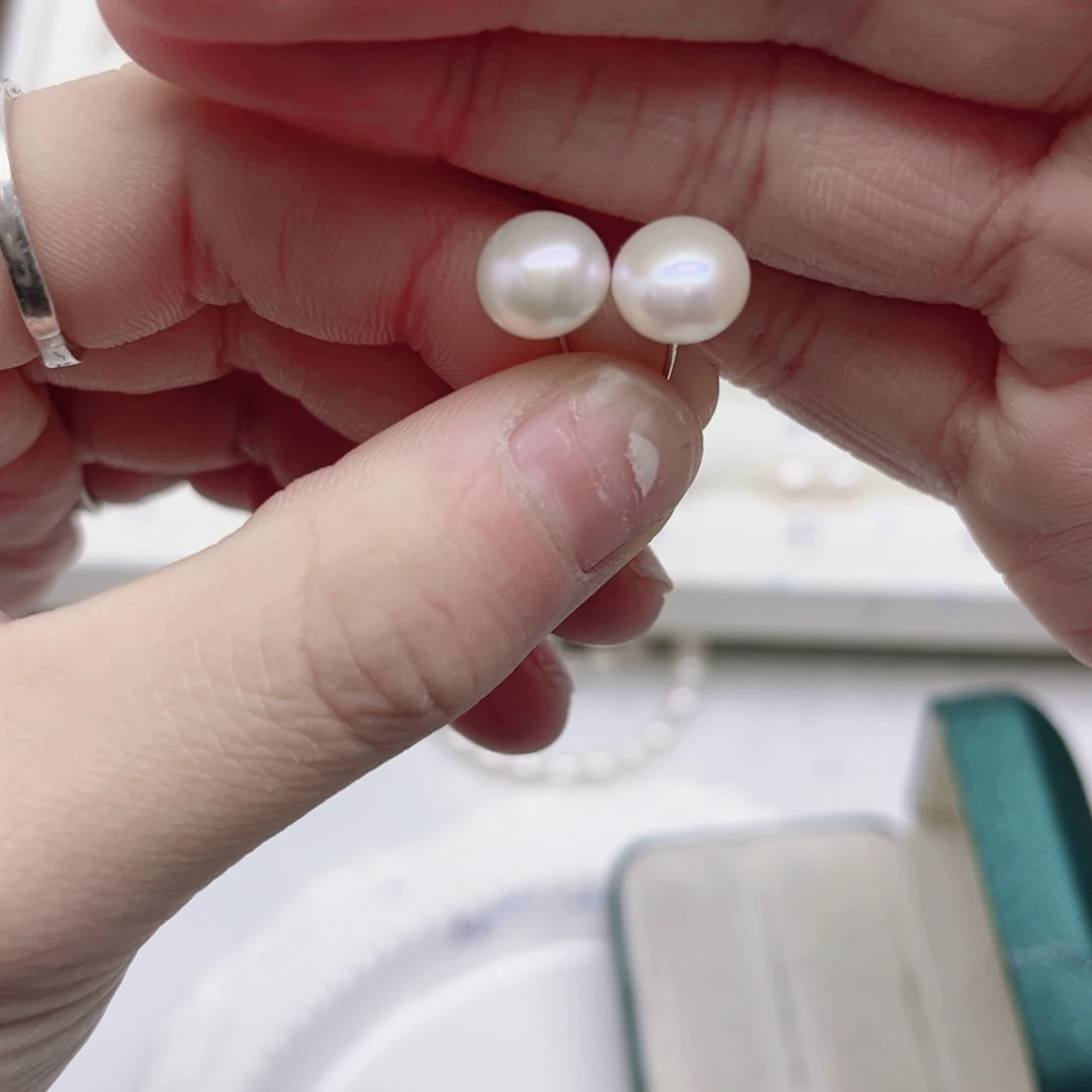 淡水珍珠耳饰银S925镶嵌三****?