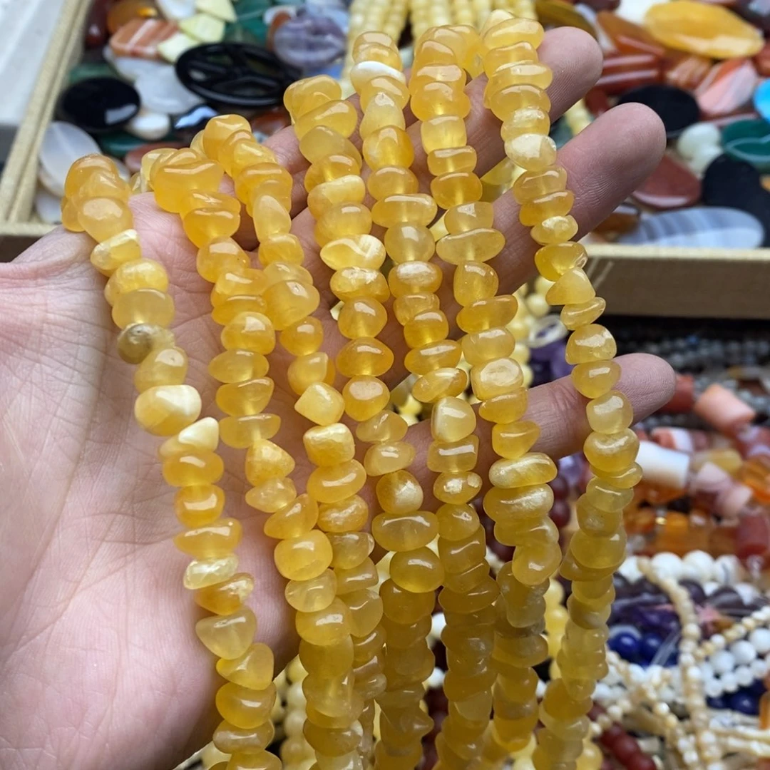 玛瑙/玉髓未镶嵌珠宝半成品一条天然润体米黄玉不规则随行
