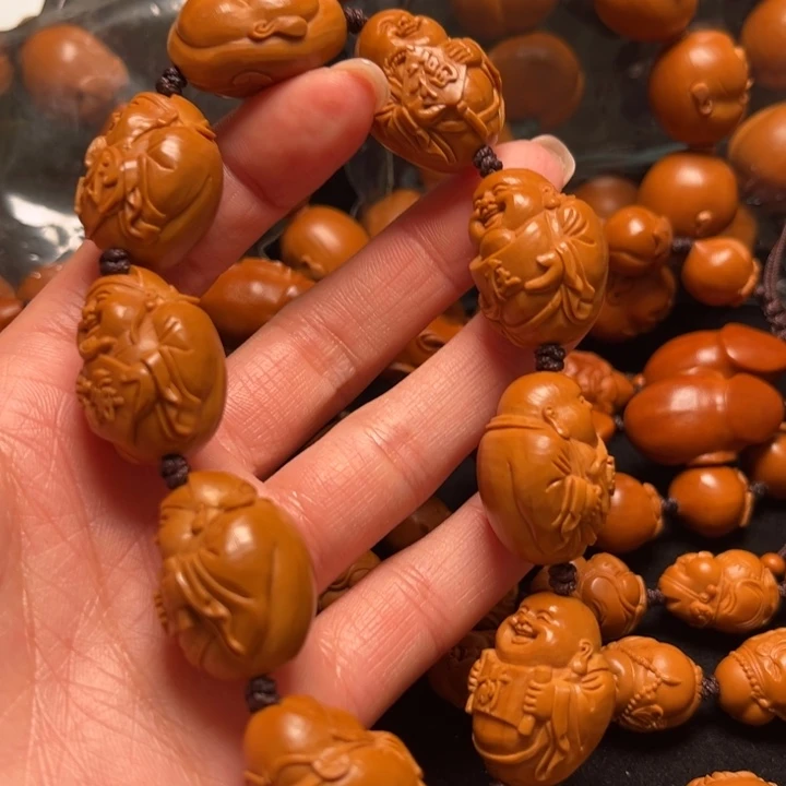 汉***落吊坠橄榄核财迷串