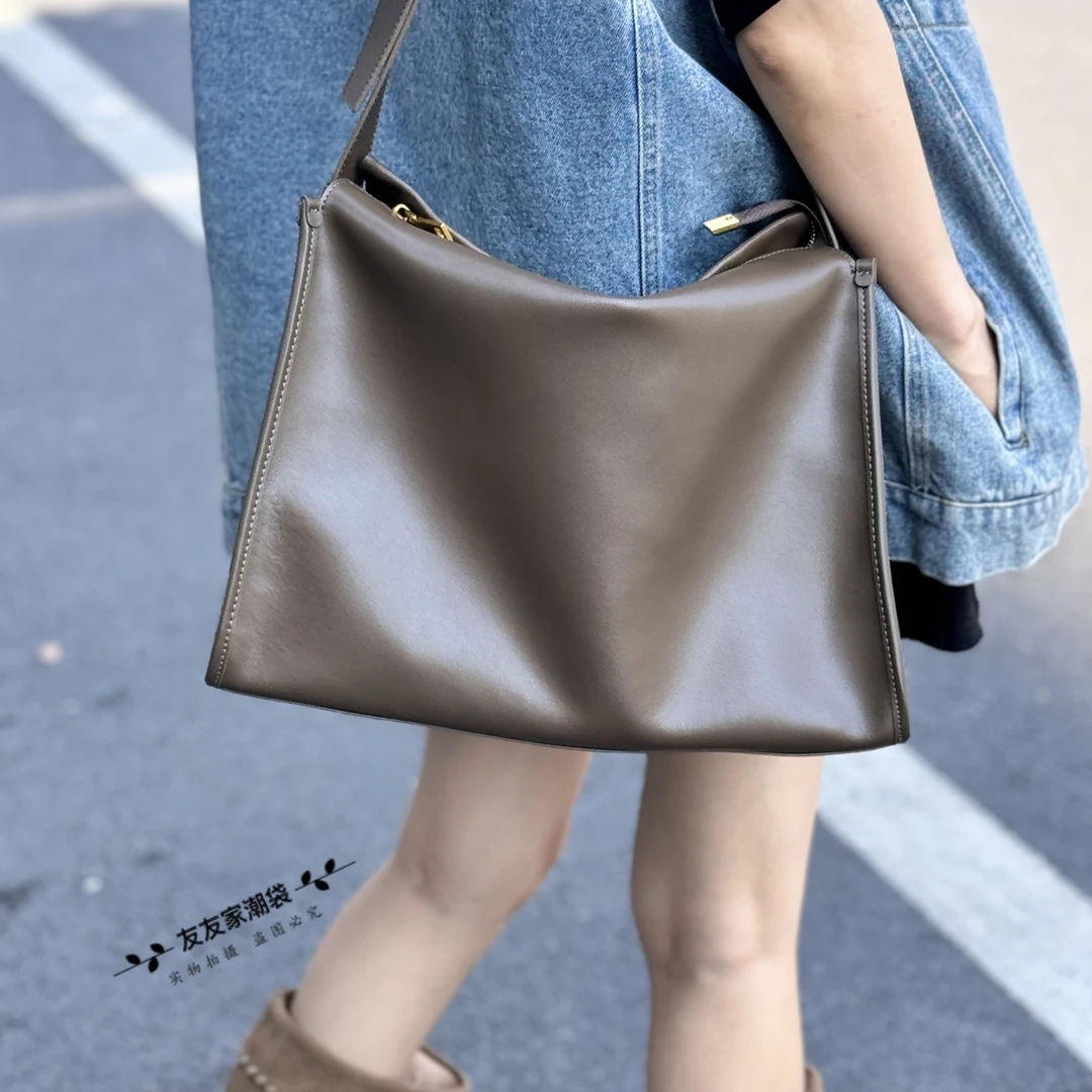 【友友家】服装界新宠儿牛皮单肩斜挎包时尚简约小众高冷酷飒女装