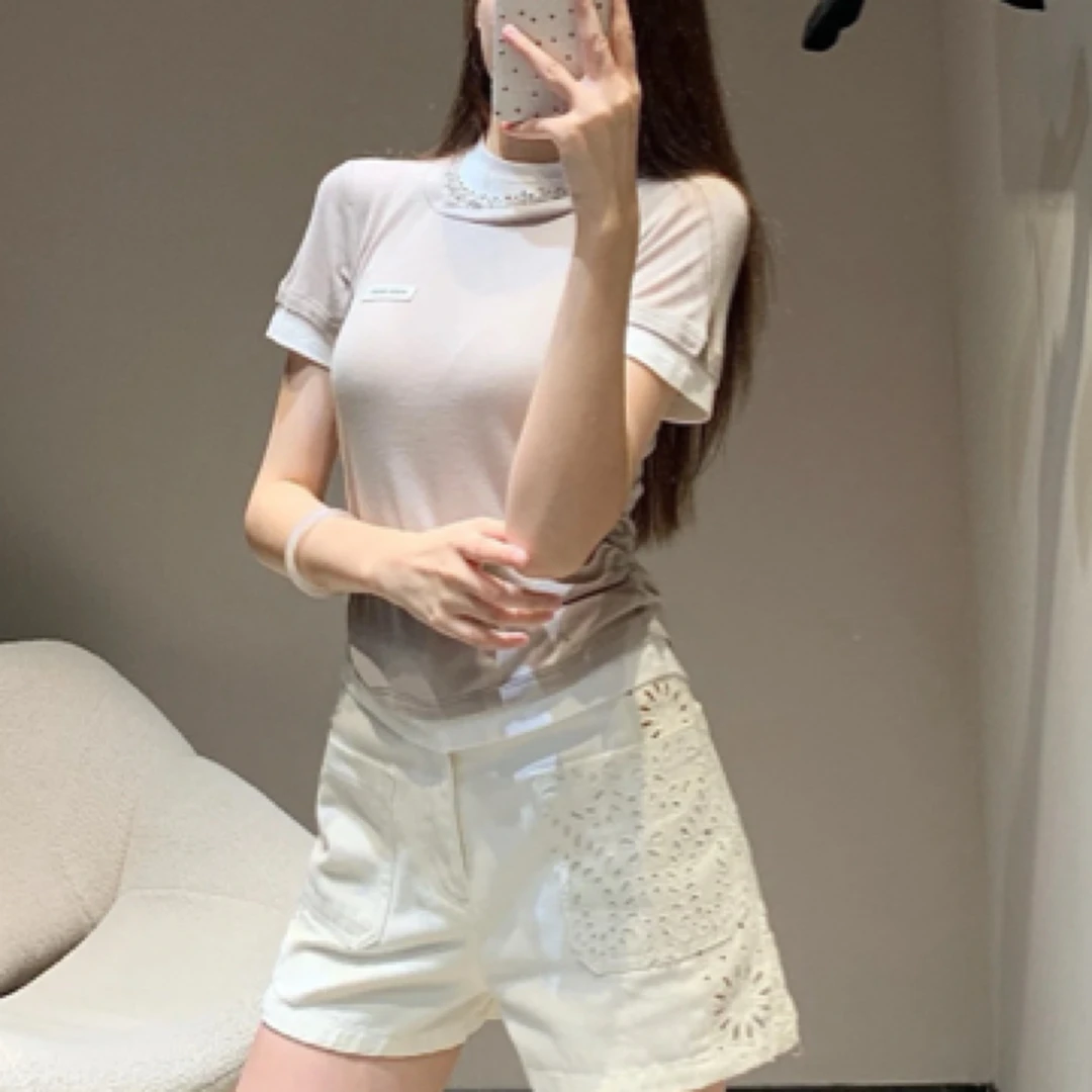 99新 DIOR/迪奥 D500968/镂空设计白色短裤/34码