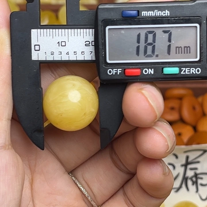 蜜蜡未镶嵌珠宝奇石鸡油黄满蜡妖花圆珠微瑕