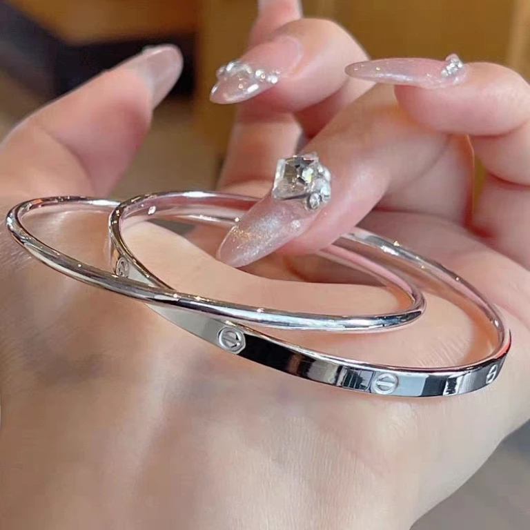 足银手镯 卡家双环足银999手镯女时尚简约光面实心闭口网红银镯子