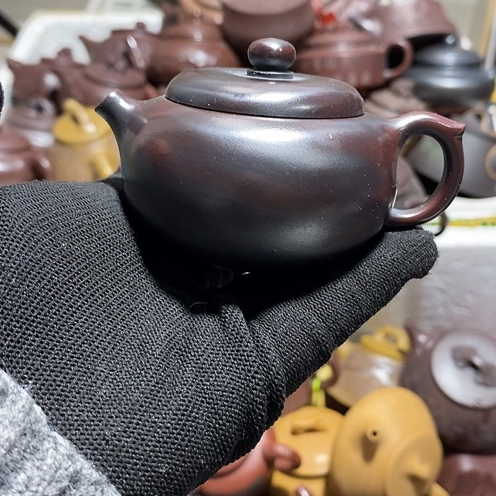 紫砂茶壶起泡微笑