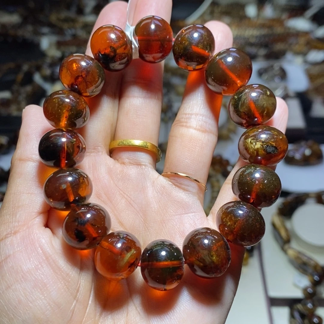 欣***然琥珀未镶嵌裸石血蜡花15mm