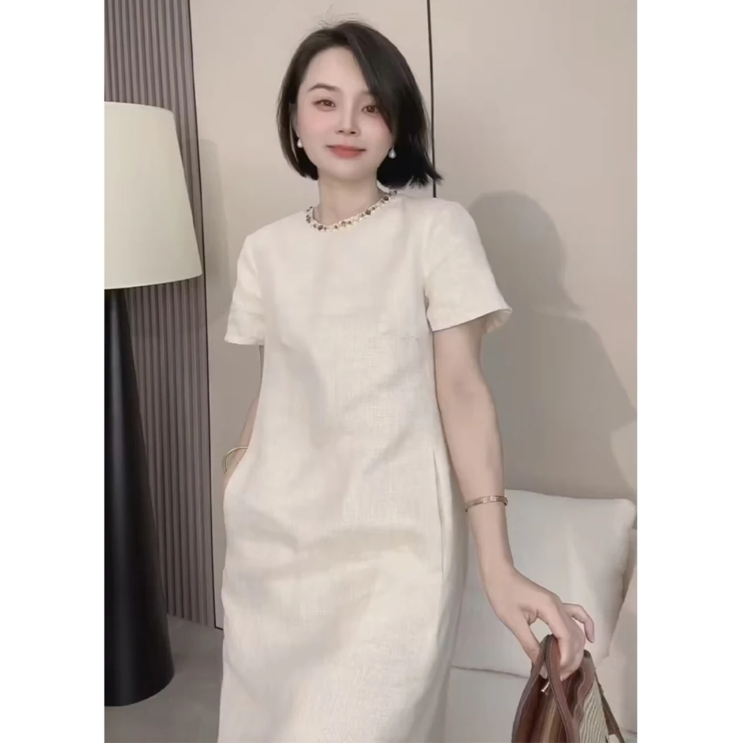 高级感时尚气质短袖白色亚麻裙子显瘦法式简约漂亮独特连衣裙女夏