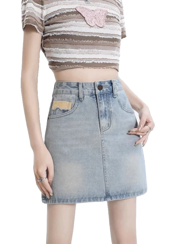 破洞牛仔短裙半身裙2025新款爆款高腰显瘦大码女装夏季包臀a字裙