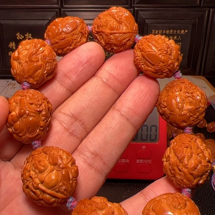 回***归橄榄核手串十八罗汉