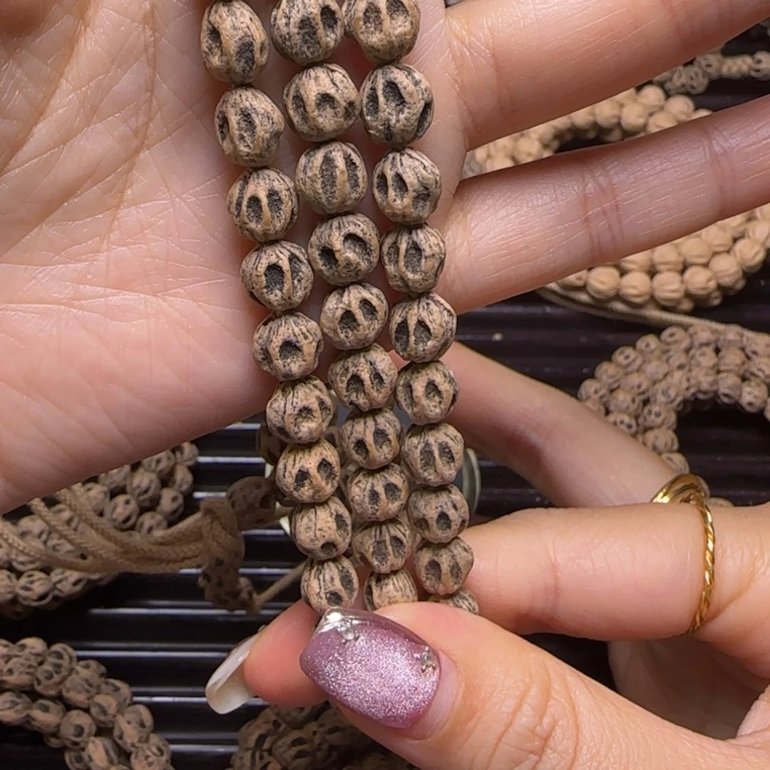 爱***己柏香籽/百香籽吊坠