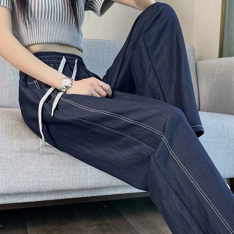 不粘腿天丝牛仔裤女春夏薄款2025新款垂感直筒松紧腰冰丝阔腿裤子