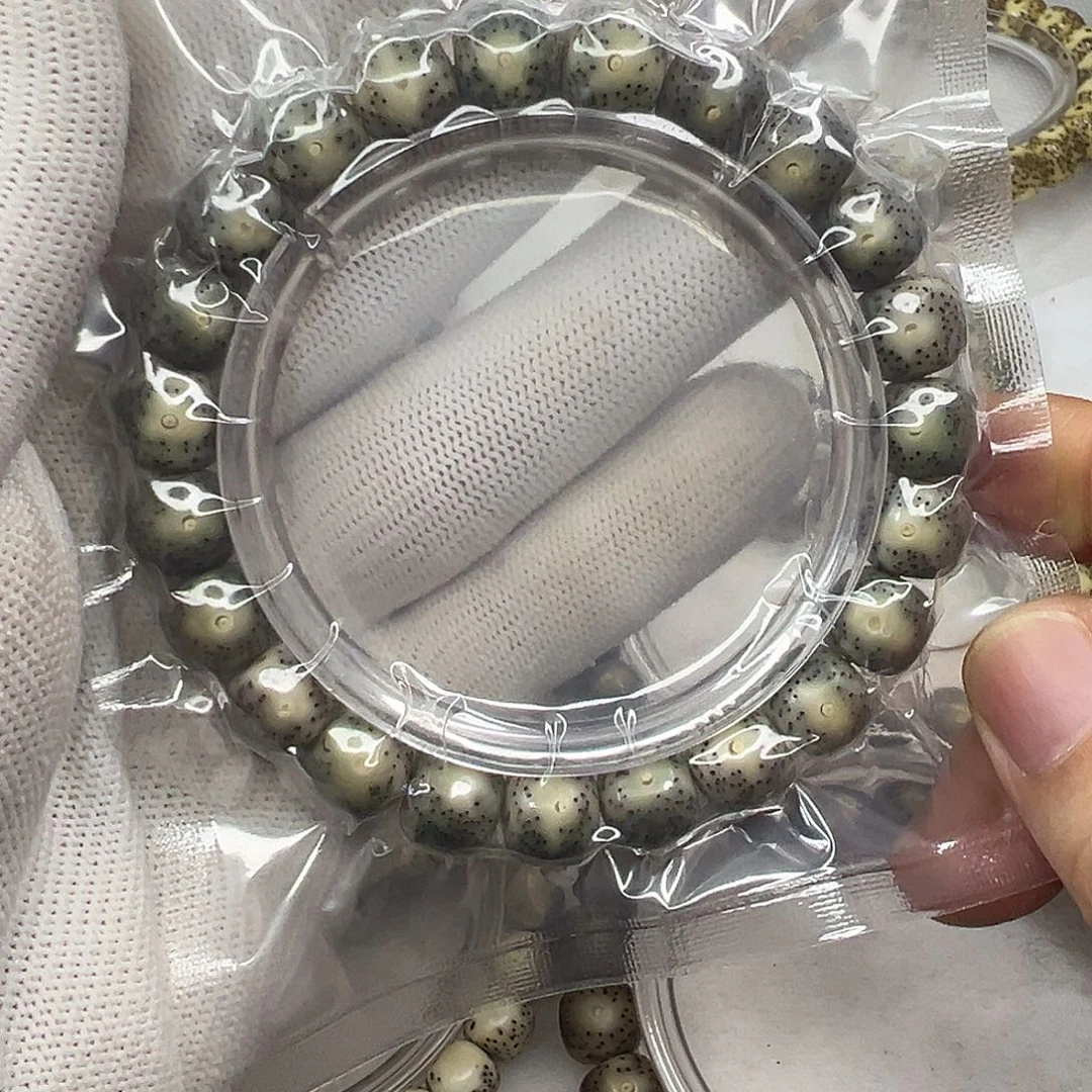 手串星月菩提10×9绿包白眼睛  124