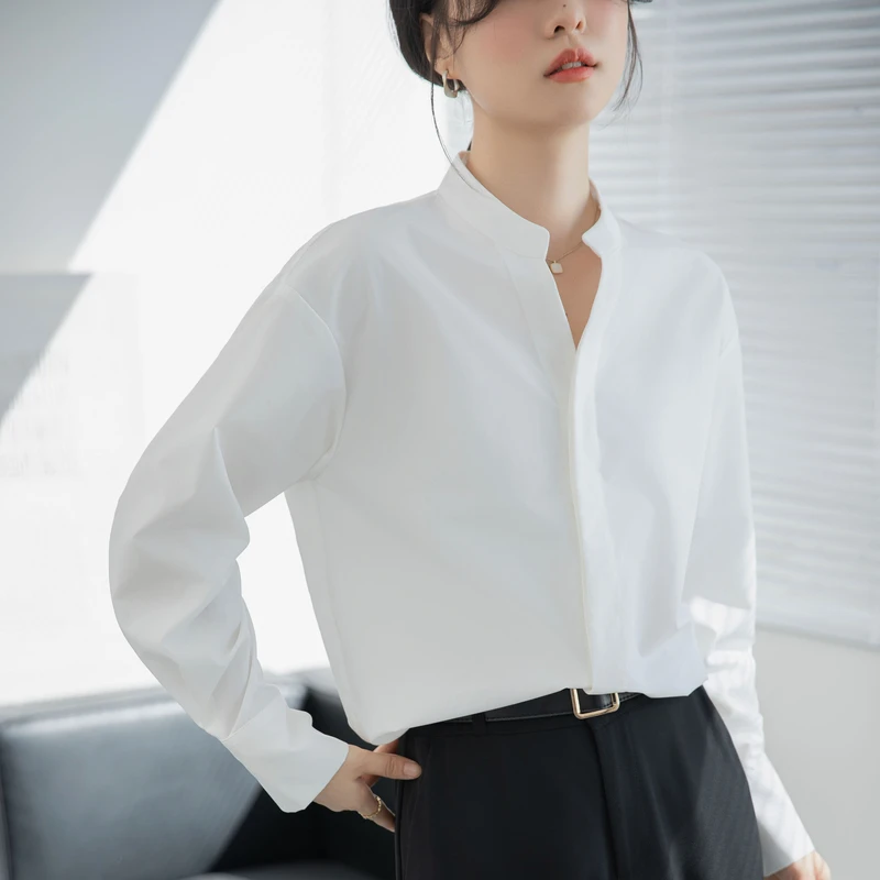 春季长袖蓝色衬衣女2025新款别致设计感高端职业工衣纯色V领衬衫