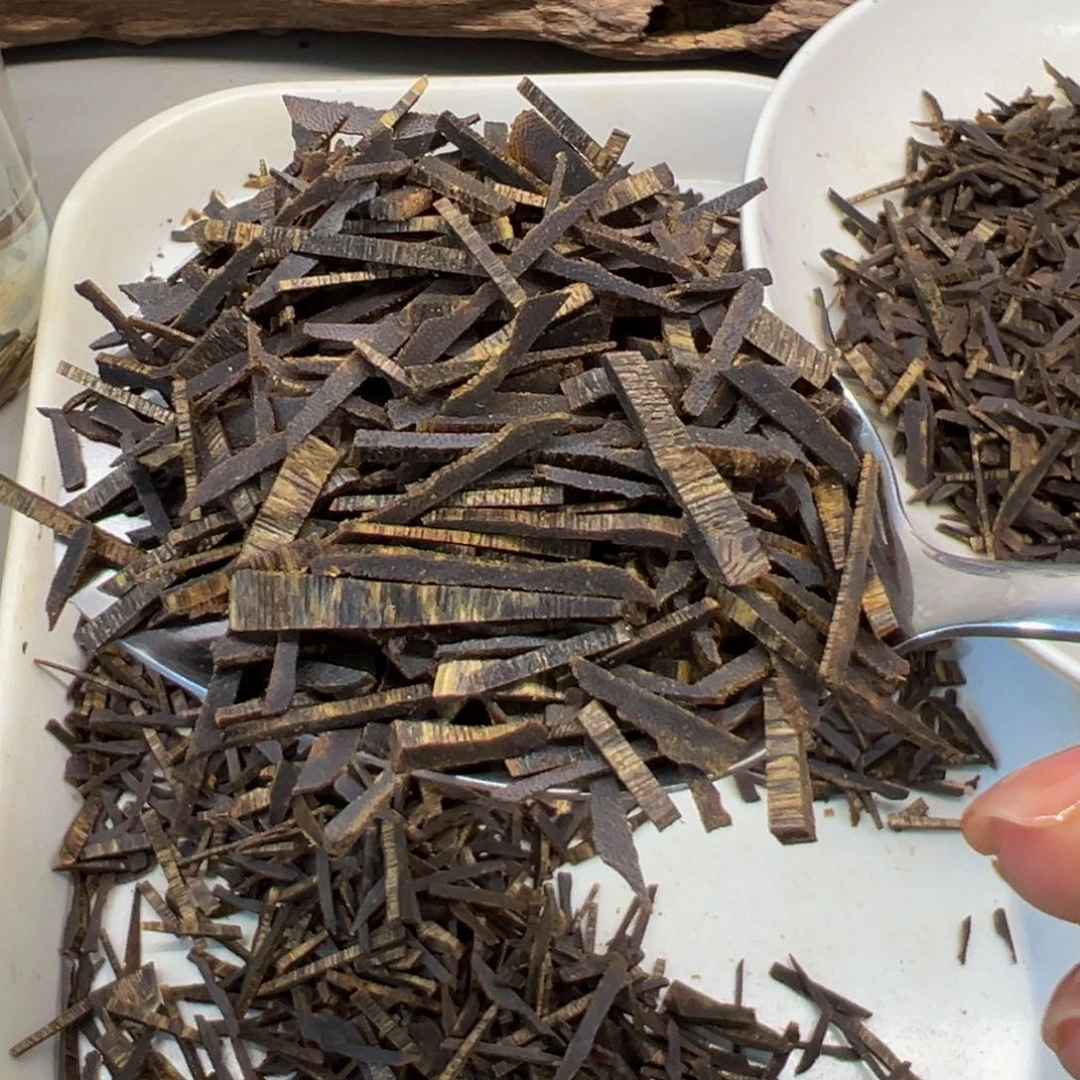 沉香沉香碎屑海南罗门黑棋沉水切条52克