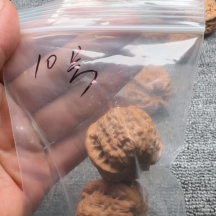 恭***财文玩核桃吊坠10号白狮子