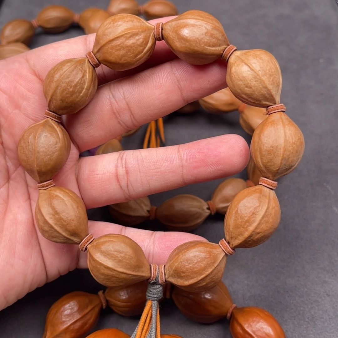 手串橄榄核1.9x2.6 精挑原生态梅林铁核